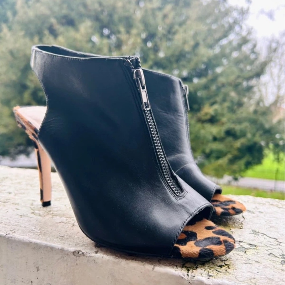 Chic Black Leather Peep-Toe Heels with Leopard Accent